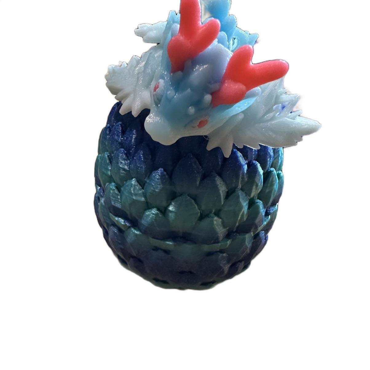 Tiny Winter dragon in Egg Figurine